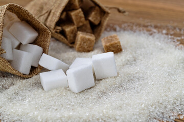 Sugar cubes on top of granulated sugar