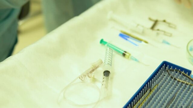 Opens packaging disposable eye microsurgery surgery operation equipment concept, from, surgeon cataract instrument