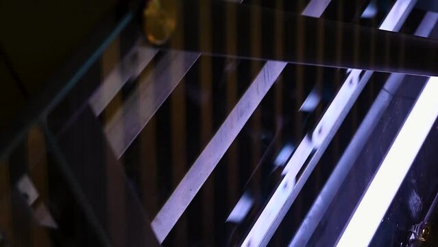 Inside an escalator, Battersea Power Station, London, United Kingdom