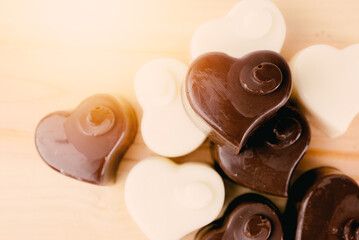 Heart chocolate on wood