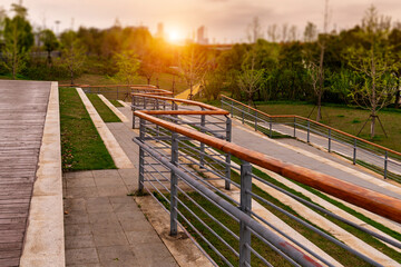 stairs with handrails on both sides in a park
