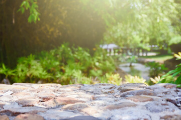stone table top, empty and blur of nature The tree can be used for displaying or editing your products..