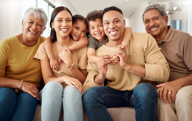 House, portrait and happy big family love enjoying quality time, gathering and having fun bonding in Colombia. Mother, father and elderly grandparents relaxing on a sofa with young children siblings
