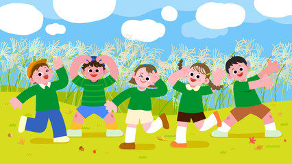 Happy children playing in the autumn meadow
