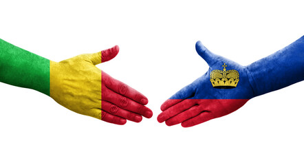 Handshake between Mali and Liechtenstein flags painted on hands, isolated transparent image.