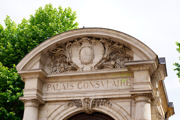 palais consulaire text on ancient wall facade building means in french consular palace