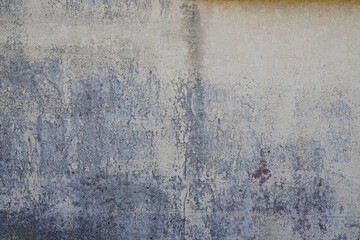 concrete old plaster wall worn by time white gray blue cracked cement background facade
