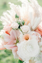 Obraz na płótnie Canvas Wedding bouquet of soft pink and white flowers close-up.