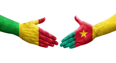Handshake between Mali and Cameroon flags painted on hands, isolated transparent image.