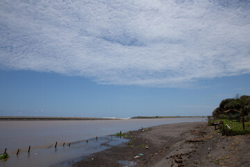 A beautiful shoreline under the blue sky