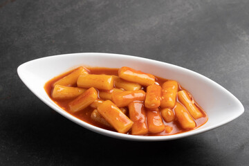 deep fried Korean rice cake tteokbokki, spicy tteokbokki, Korean style food.