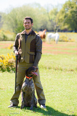 male hunter and his dog
