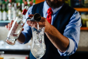 Bartender guy working prepare cocktail skills