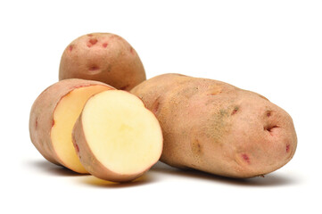 potatoes close up, whole and sliced, objects are isolated on a white background