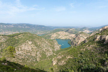 Beautiful landscape photo of the cortes del pallas reservoir with a boat on the water and beautiful...