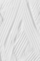 Obraz premium The texture of the white cream. Cosmetic background. Cosmetic product for body care. Wellness and beauty concept.