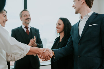 professional business people shaking hands in the office. Finishing successful meeting. businessman persons handshake with partner teamwork, concept of partnership approve a job agreements deal