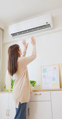 woman use heating at home