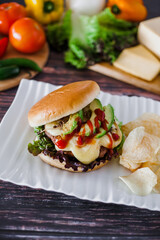 mexican burger with chips and avocado on table food with ingredients in Mexico	