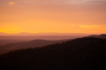 Mountainous landscape during colorful sunset in Northern Finland  - 539656524