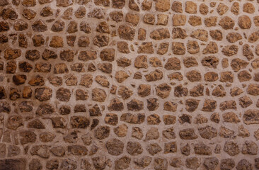 An old stone wall background. 