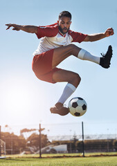 Fototapeta na wymiar Soccer kick trick, football and man athlete from Israel on a sport field outdoor with motivation. Fitness, exercise and training workout of a person ready for a sports game, cardio and play energy
