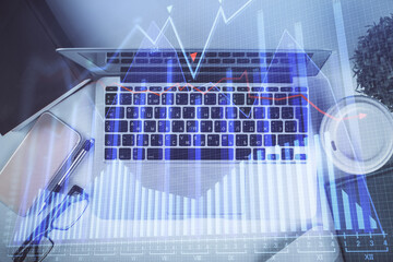 Multi exposure of financial chart drawing over table background with computer. Concept of research. Top view.