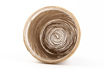 close-up of brown jute twine for DIY and gift wrapping, isolated on white background, concept of zero waste or sustainable lifestyle.