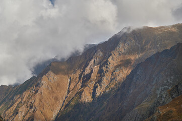 Landscape of a mountain ridge  touched by the the stormy sky
