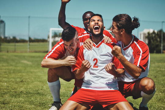 Success, happy team or winner for soccer player celebration during match at soccer field, stadium or sport workout. Teamwork, achievement or friends for fitness goal, wellness or football exercise.
