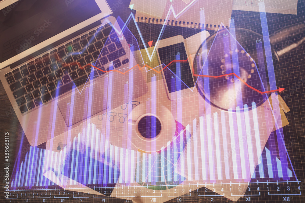 Poster Financial market graph and top view computer on the desktop background. Multi exposure. Investment concept.