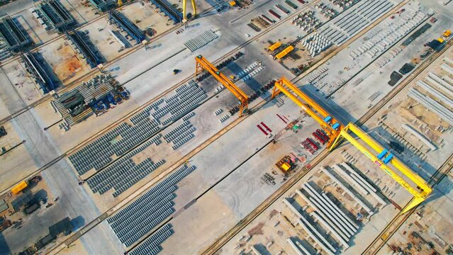 Aerial view flying over a concrete factory, Concrete industry plant. infrastructure industry. aerial drones footage. 4K
