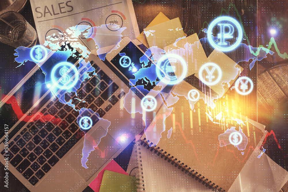 Poster financial market graph and top view computer on the desktop background. multi exposure. investment c
