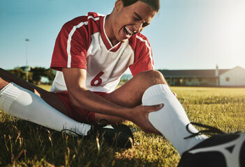 Man, soccer and sport leg injury suffering in pain, agony and discomfort during training match or...