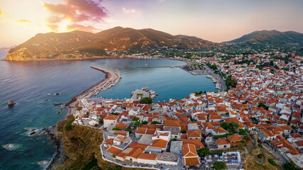 Aerial view of the town of Skopelos island with the traditional, red roofed houses during a calm...