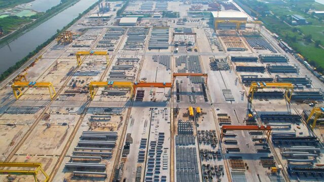 Aerial view flying over a concrete factory, Concrete industry plant. infrastructure industry. aerial drones footage. 4K

