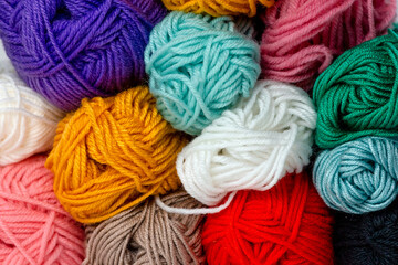 Collection of colorful skeins of threads from above. Horizontal format. For handmade, hobby and craft.