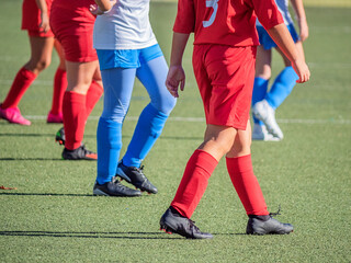 Fototapeta premium unrecognizable legs of a young team soccer player