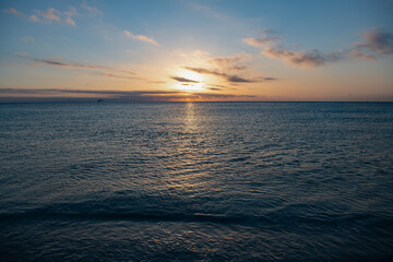 Fototapeta premium beautiful evening sky with sea water on the summer beach