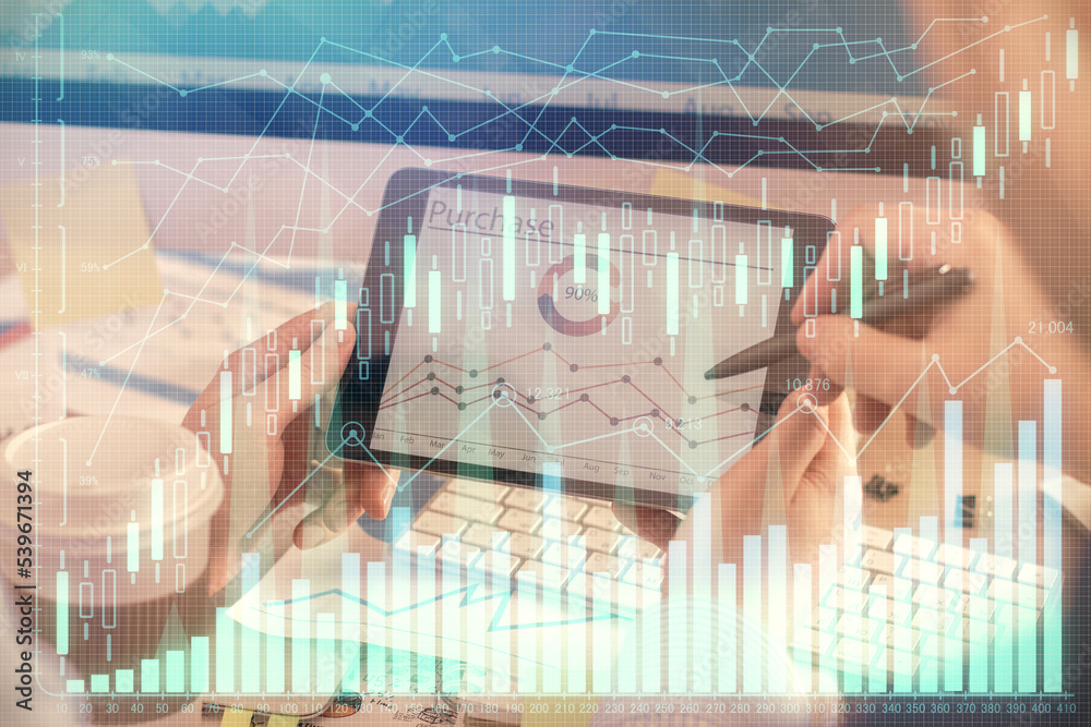 Poster double exposure of man's hands holding and using a phone and financial chart drawing. market analysi