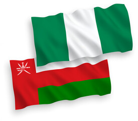 Flags of Sultanate of Oman and Nigeria on a white background
