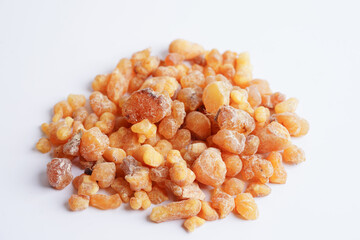 Frankincense or olibanum aromatic resin isolated on white background used in incense and perfumes.