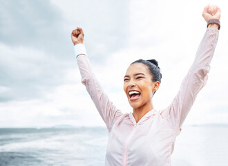 Happy woman, beach fitness success and achievement, freedom and motivation goals, energy and...