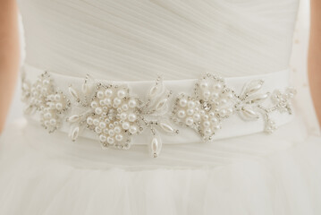 Necklace embroidery on the belt