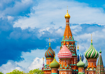 Fototapeta na wymiar The Cathedral of Vasily the Blessed (Saint Basil's Cathedral) on Red square in summer day before the rain. Black clouds. Moscow. Russia