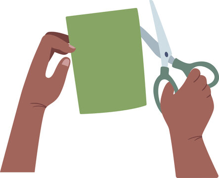 Paper cutting process with hands and scissors