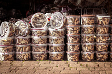 Mushroom stall at the farmers market. Lots of jars of dried porcini mushrooms.