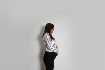 Pregnant women standing sad and thinking about on abortion