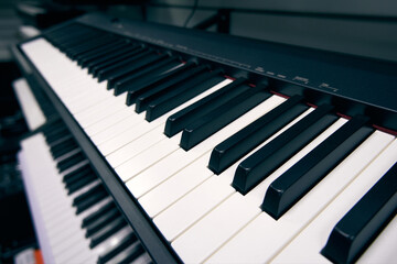 Naklejka premium Close-up digital piano keyboard. Selective focus