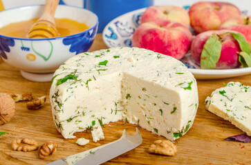 Head of homemade cheese on the white background